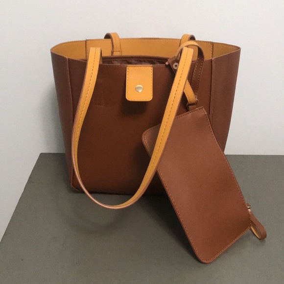 Tommy Bahama Reversible Faux Leather Tote Wristlet - Picture 12 of 16